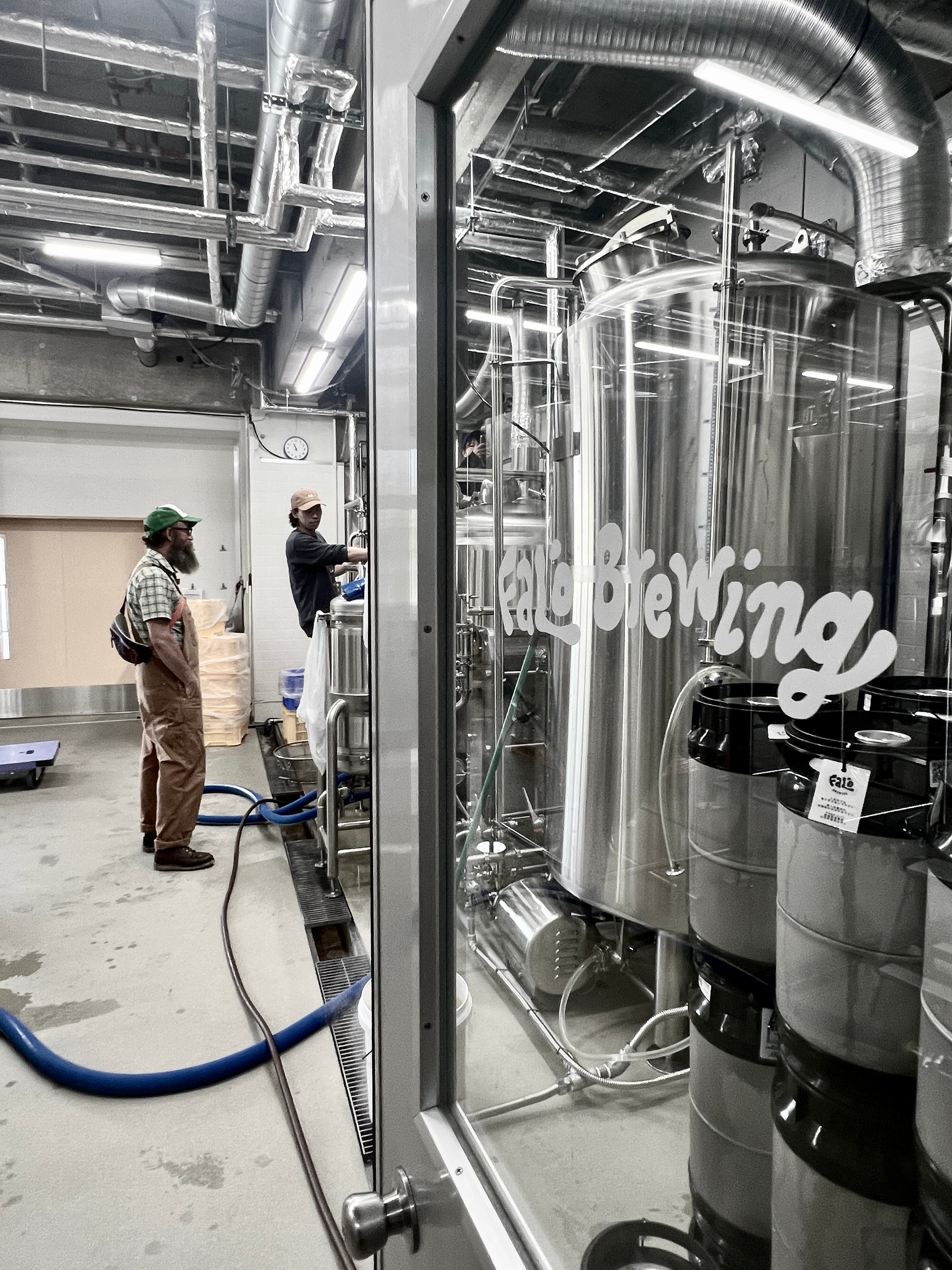 Sailors Grave Brewing Chris and Falo Brewing Naru Handa working together
at Falo Brewing