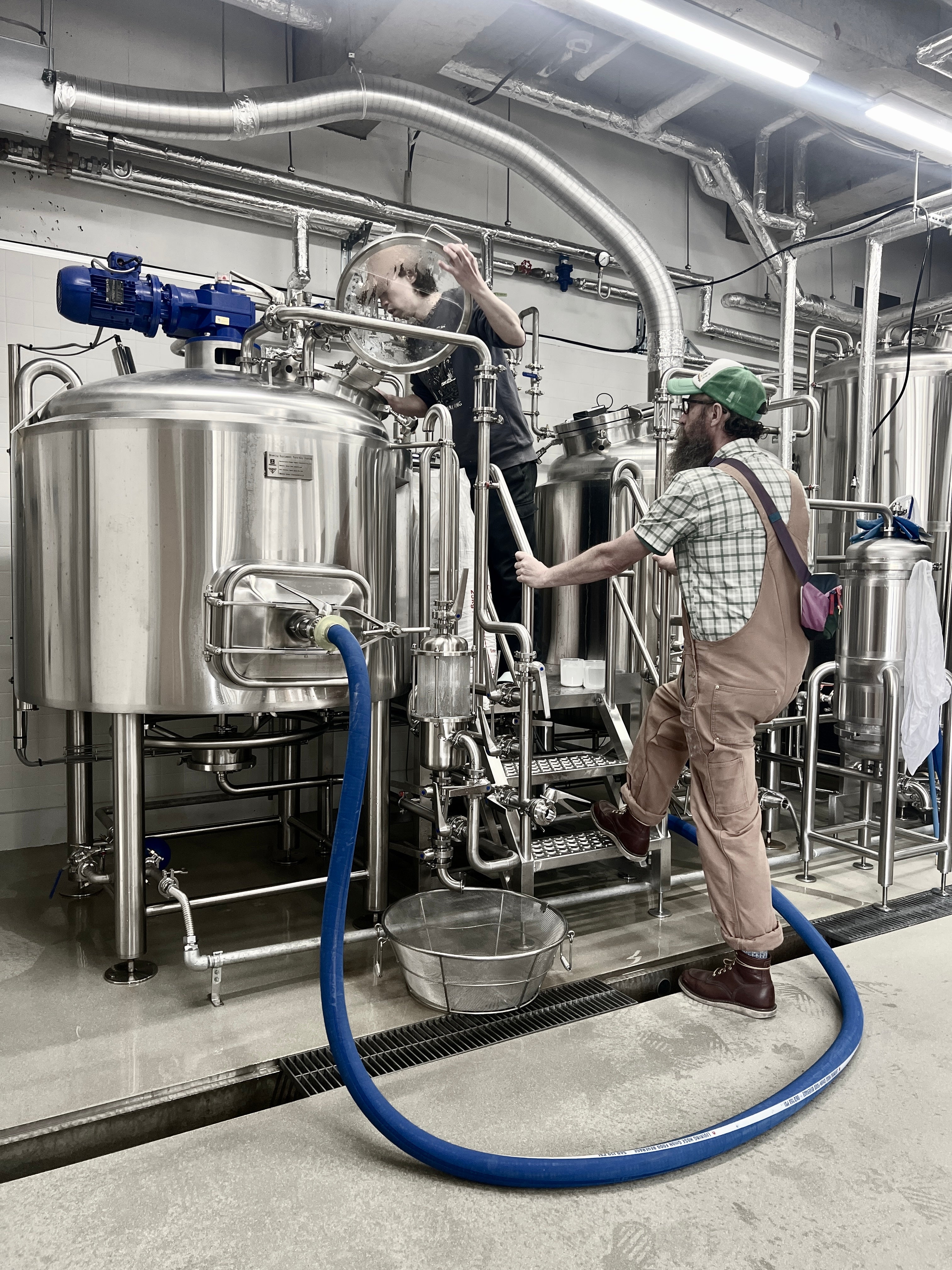 Sailors Grave Brewing Chris and Falo Brewing Naru Handa working together 
at Falo Brewing